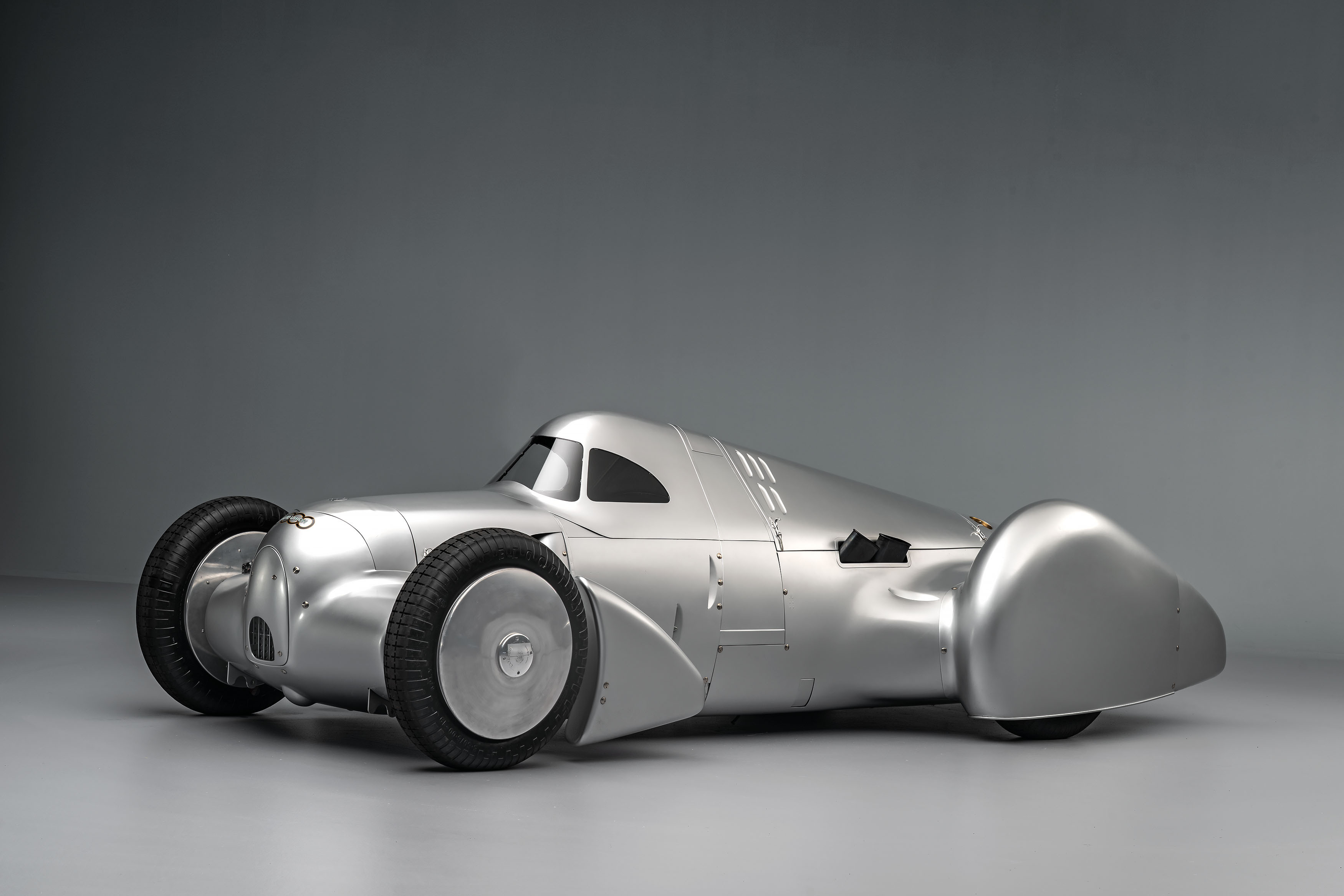 Audi recreated the Auto Union Lucca. After just over three years of construction, the record-breaking car was completed in early 2026. Studio shot. Side view.
