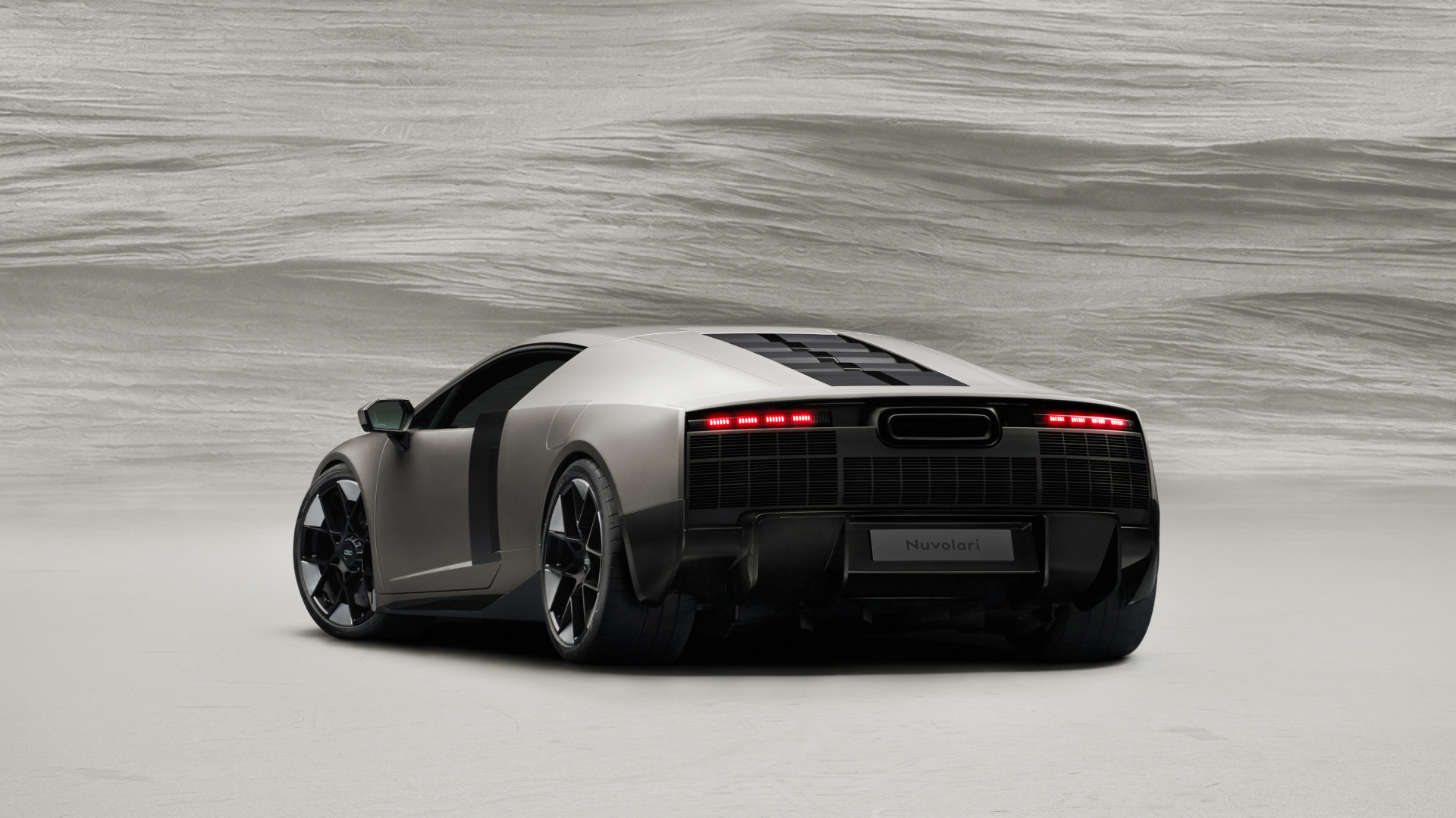 Titanium, static studio shot, exterior, rear three-quarter view