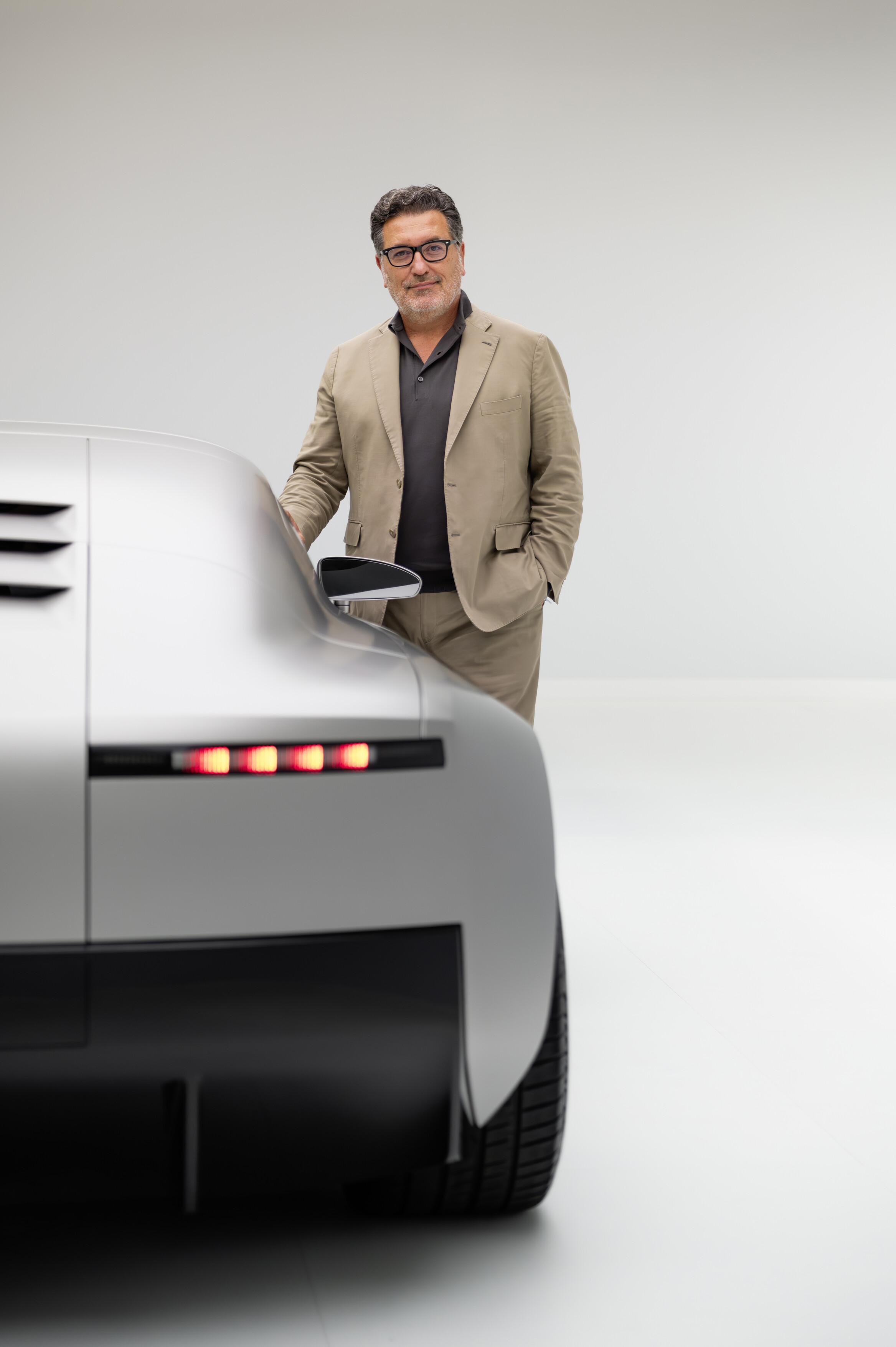 Audi Concept C Chief Creative Officer Massimo Frascella beside the Audi Concept C